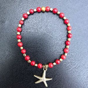 Red and gold starfish bracelet